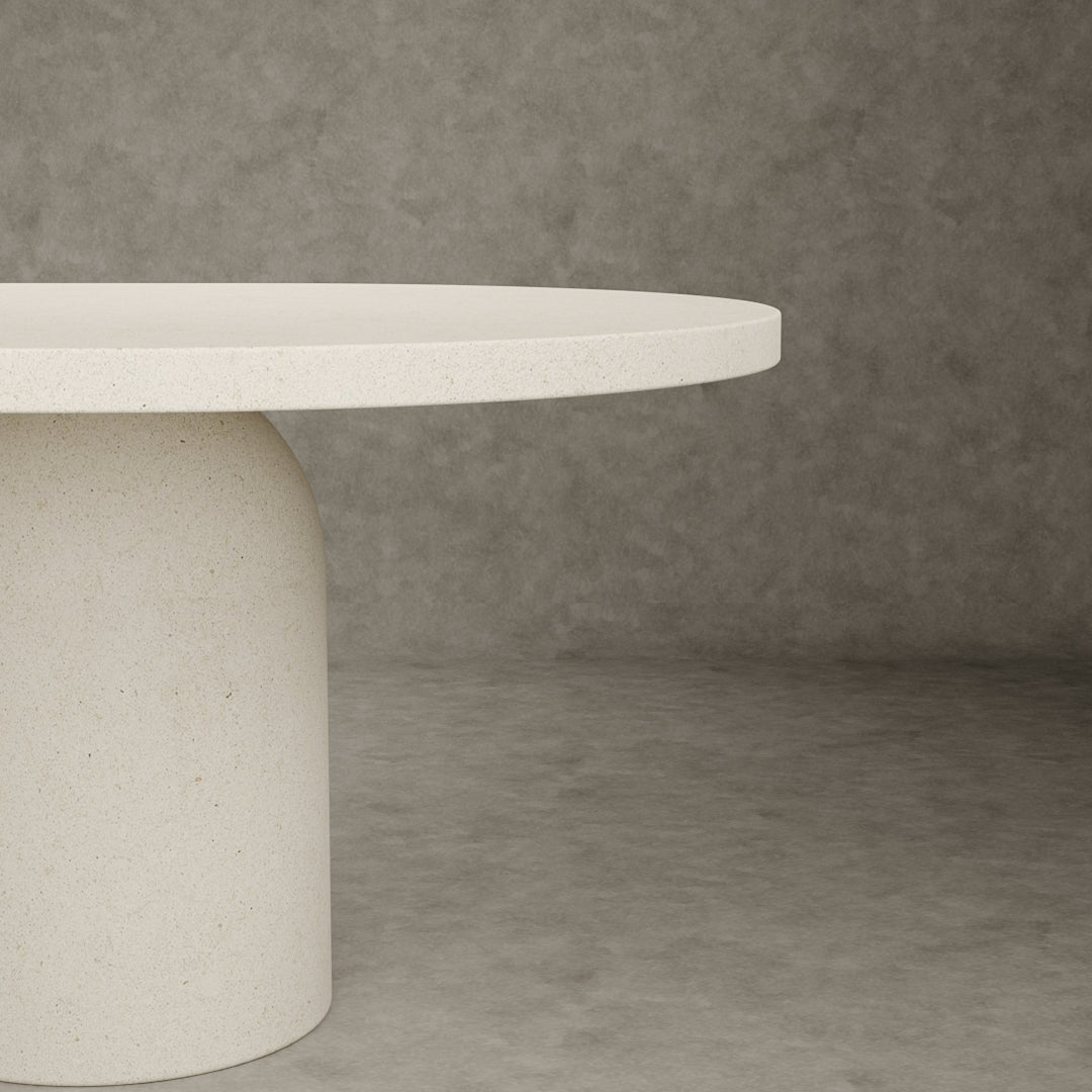 Tenga Micro Concrete Dining Table with a semicircular table top.
